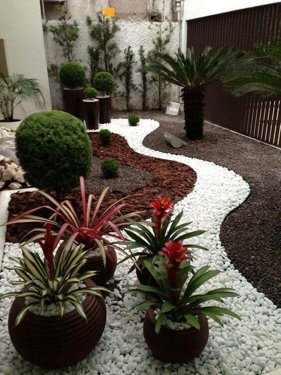 jardim de inverno com pedras brancas